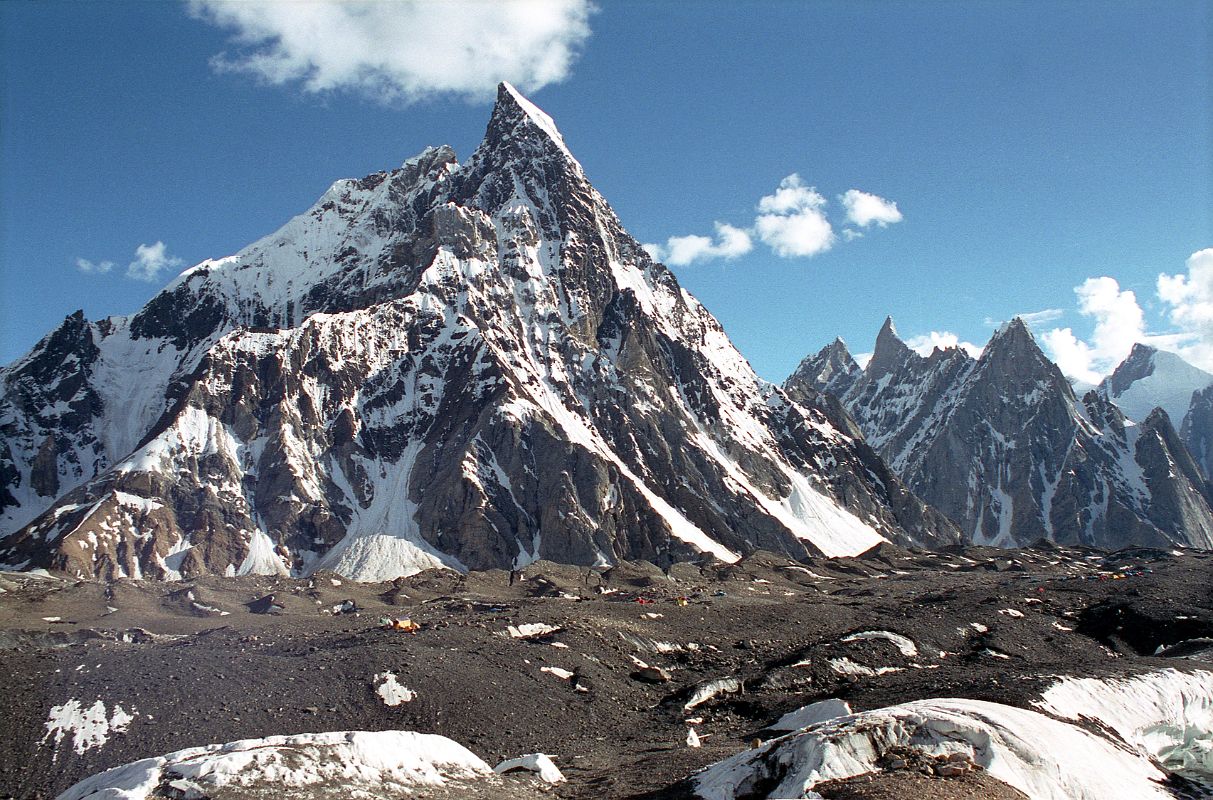 01 Concordia Campsite below Mitre Peak Our campsite at Concordia (4745m) is beautifully situated below Mitre Peak. Concordia was named by Sir Martin Conway in 1892 after the Place de la Concorde in Paris. Concordia is the junction of Baltoro Glacier, Godwin Austin Glacier (descending from K2), and the Upper Baltoro Glacier. The view from all around is incredible.